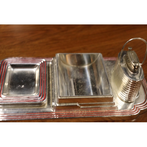 89 - Chromed art deco style smokers desk set comprising lighter, lidded box and for ashtrays,  22cm ... 