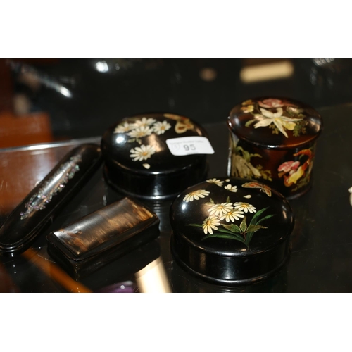 95 - Three lacquered and floral decorated jars, a 19th century horn snuff box and a lacquered spectacle c... 