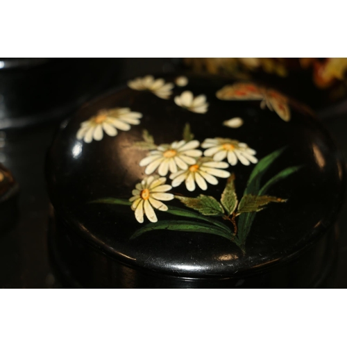 95 - Three lacquered and floral decorated jars, a 19th century horn snuff box and a lacquered spectacle c... 