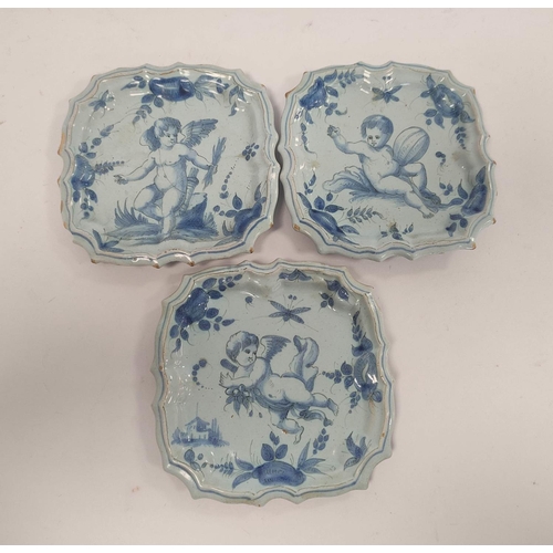 263 - Three matching Cantagalli style blue and white side plates, with blue underglazed winged putti, with... 