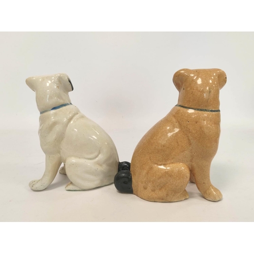 266 - Two early 20th century Staffordshire style ceramic figures modelled as seated pug dogs, with painted... 