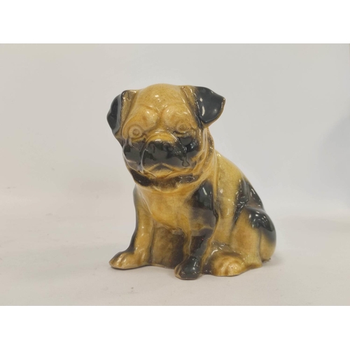 267 - Four early 20th century assorted ceramic pug, and similar, dog models, all in seated poses, to inclu... 