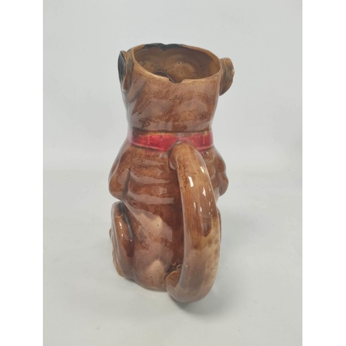 268 - 19th century continental majolica tobacco jar, modelled as a pug dog in seated pose, wearing red bow... 