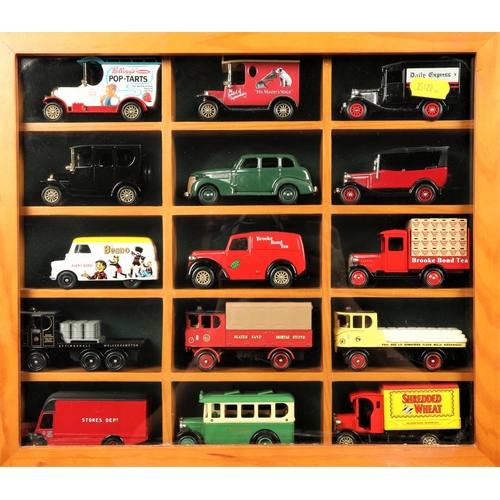 262 - Four wall mounted cabinets each containing fifteen commercial model vehicles mainly Vanguard Lledo, ... 