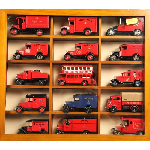 262 - Four wall mounted cabinets each containing fifteen commercial model vehicles mainly Vanguard Lledo, ... 