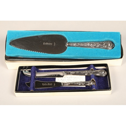 203 - Sterling silver handled pie server and two sterling silver handled cheese and butter knives in boxes... 