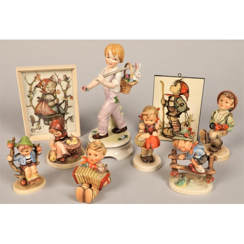 44 - Hummel W Goebbel figurine of  a boy with rabbit, six other Hummel figures and two pictures (9)
