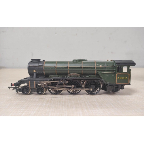 104 - Box of 00 gauge engines and rolling stock comprising of issues from Hornby, Triang etc to include Ho... 