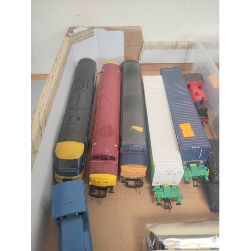 110 - Box of 00 gauge engines and rolling stock comprising of issues from Hornby, Bachmann etc to include ... 