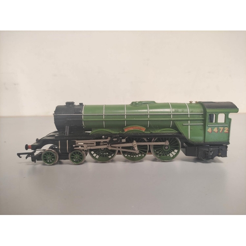 113 - Box of 00 gauge locomotives and rolling stock comprising of Tri-ang Class 4-6-2 