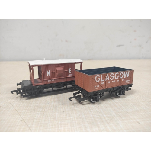 88 - Large collection of 00 gauge rolling stock comprising predominately of examples by Hornby and Mainli... 