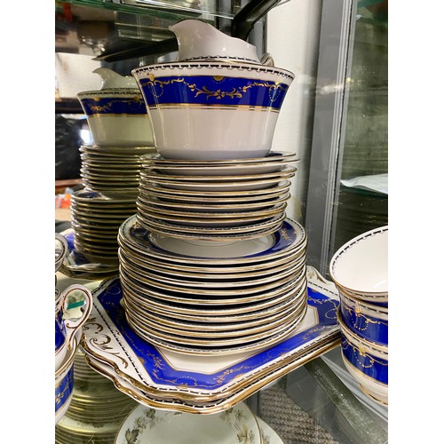 179 - Blue and gilt tea set including two sandwich plates