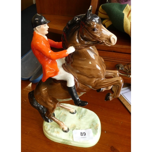 77 - Beswick huntsman on horseback no 868, 26cm high