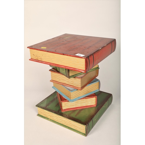 534 - Small occasional table in the form of a pile of books 42cm h 33cm d