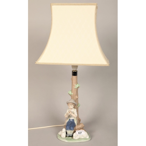 537 - Nao table lamp modelled with a boy and sheep, lamp 30cm high