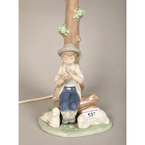 537 - Nao table lamp modelled with a boy and sheep, lamp 30cm high