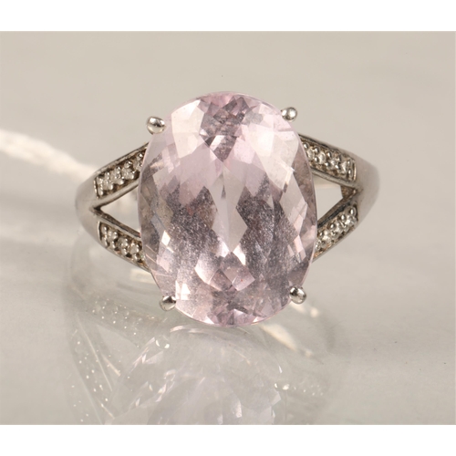 110 - Ladies 9ct white gold dress ring set with large pale pink stone, white stones on shoulders
