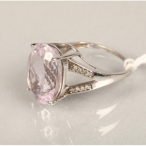 110 - Ladies 9ct white gold dress ring set with large pale pink stone, white stones on shoulders