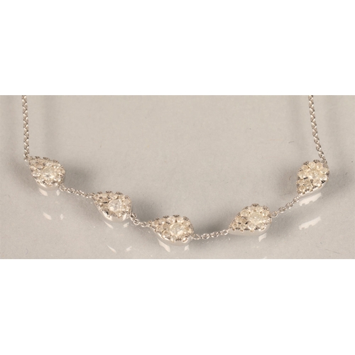 83 - 9ct white gold Diamond bracelet with five tear drop Diamond clusters