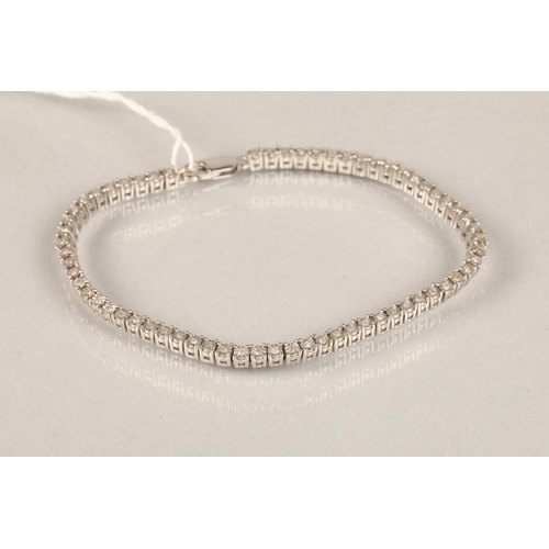 86 - Stirling silver tennis bracelet bezel set with small Diamonds