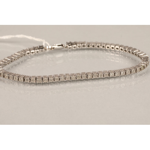 86 - Stirling silver tennis bracelet bezel set with small Diamonds