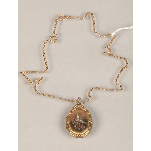 89 - Yellow metal locket pendant mounted on a 9ct gold chain