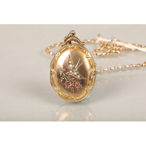 89 - Yellow metal locket pendant mounted on a 9ct gold chain