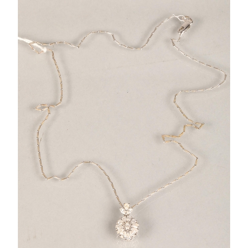 91 - Ladies 9ct white gold Diamond cluster pendant on a 9ct white gold chain