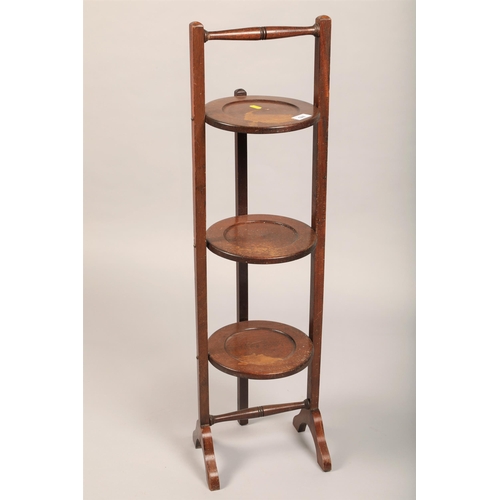 528 - Three tiered mahogany cake stand