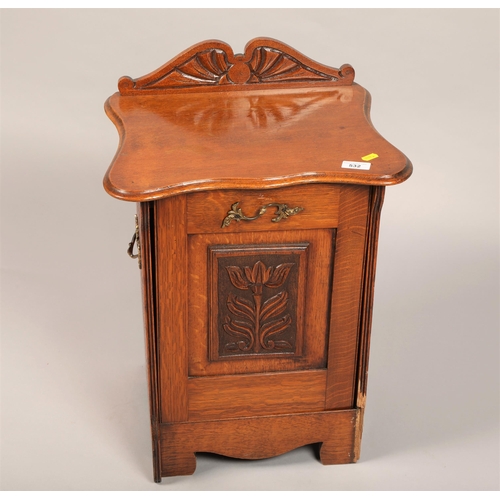 532 - Carved oak side table with pull-out coal scuttle/waste bin 53cm h, 34cm d