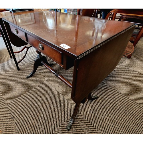 539 - Mahogany pembrook table with brass feet h74cm