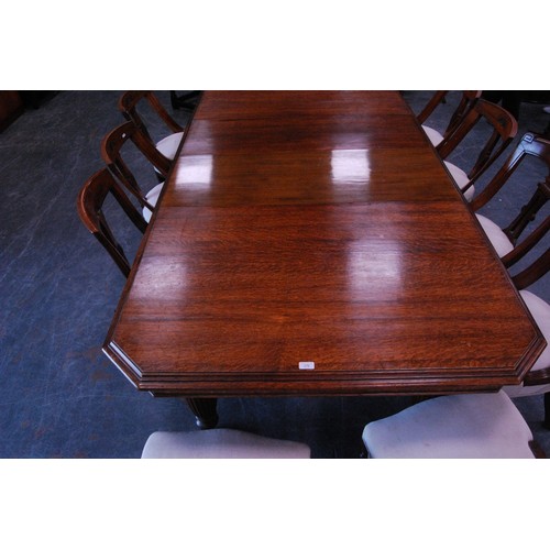 376 - Late Victorian oak extending dining table with two additional leaves, on reeded baluster legs and ca... 