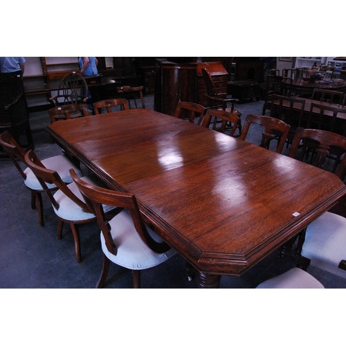 376 - Late Victorian oak extending dining table with two additional leaves, on reeded baluster legs and ca... 