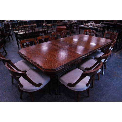 376 - Late Victorian oak extending dining table with two additional leaves, on reeded baluster legs and ca... 