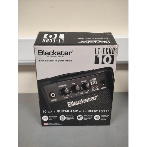 447 - Blackstar LT-Echo 10 10 watt guitar amp with delay complete with box. Also two Behringer HA400 micro... 