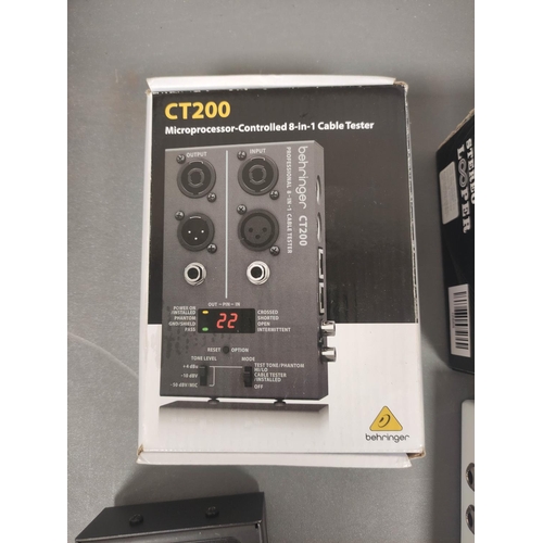 448 - Boxed Behringer CT200 microprocessor controlled 8-in-1 cable tester, and a boxed Ammoon stereo loope... 