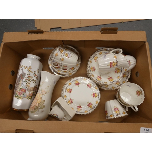 124 - Floral decorated tea set and two vases, etc.