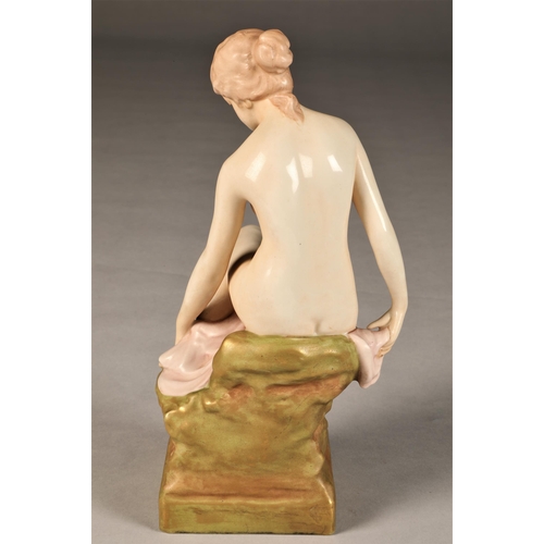 58 - Art Nouveau Bohemia Royal Dux porcelain figure, a seated maiden with a pink robe, applied red triang... 