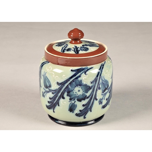 44 - McIntyre Tobacco jar and cover, brown bands with blue stylised flower decoration, brown factory stam... 