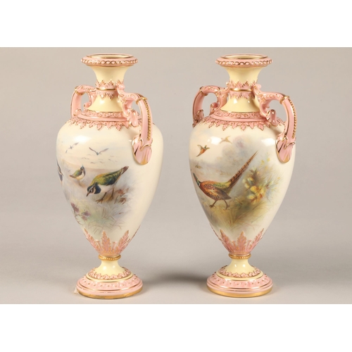 6 - Pair Royal China Works Worcester vases, double handles and raised on circular feet, decorated in pin... 