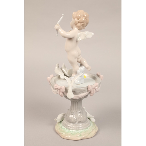 31 - Lladro cherub atop fountain with doves 6458