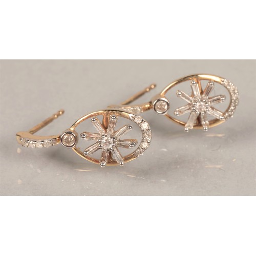 71 - Pair 9ct gold diamond set earrings with rotating flower design