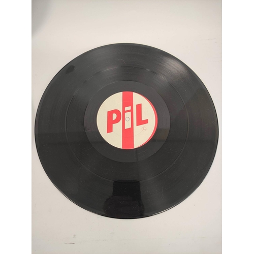 335A - Public Image Limited. Limited edition three record box set complete with metal case, track listings ... 