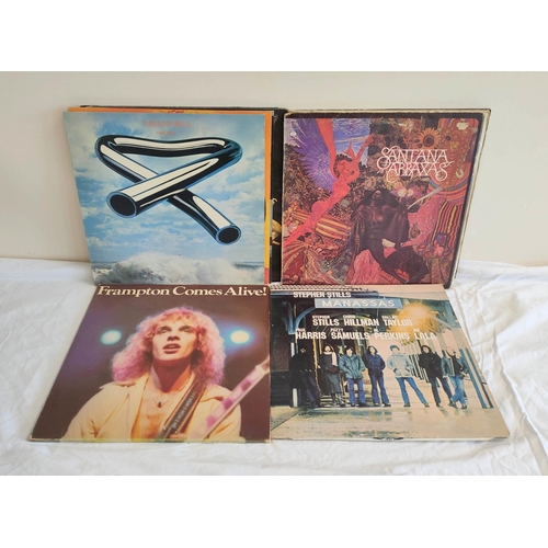 335B - Collection of 70s records to include The Who Who's Next, Santana Abraxas and two others. Also a firs... 