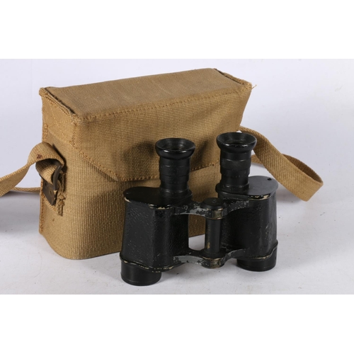 172 - Pair of Dollond WWII binoculars marked with broad arrow and canvas carrying case marked 1941,15cm hi... 