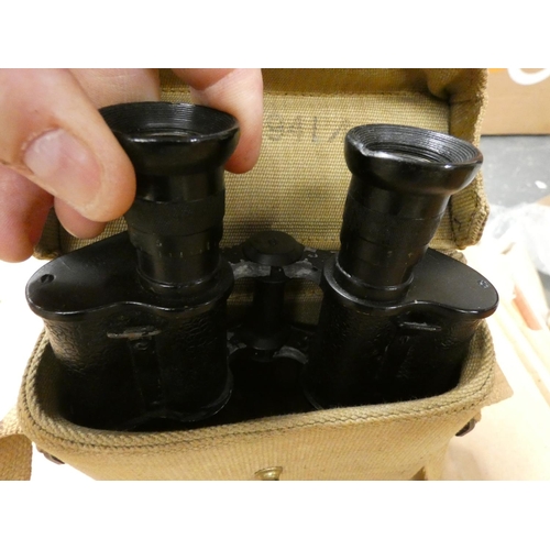 172 - Pair of Dollond WWII binoculars marked with broad arrow and canvas carrying case marked 1941,15cm hi... 