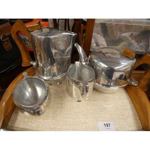 197 - Four piece Piquot Ware tea set and tray.