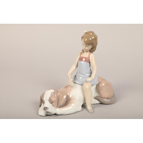 15 - Three Lladro figures of children and puppies