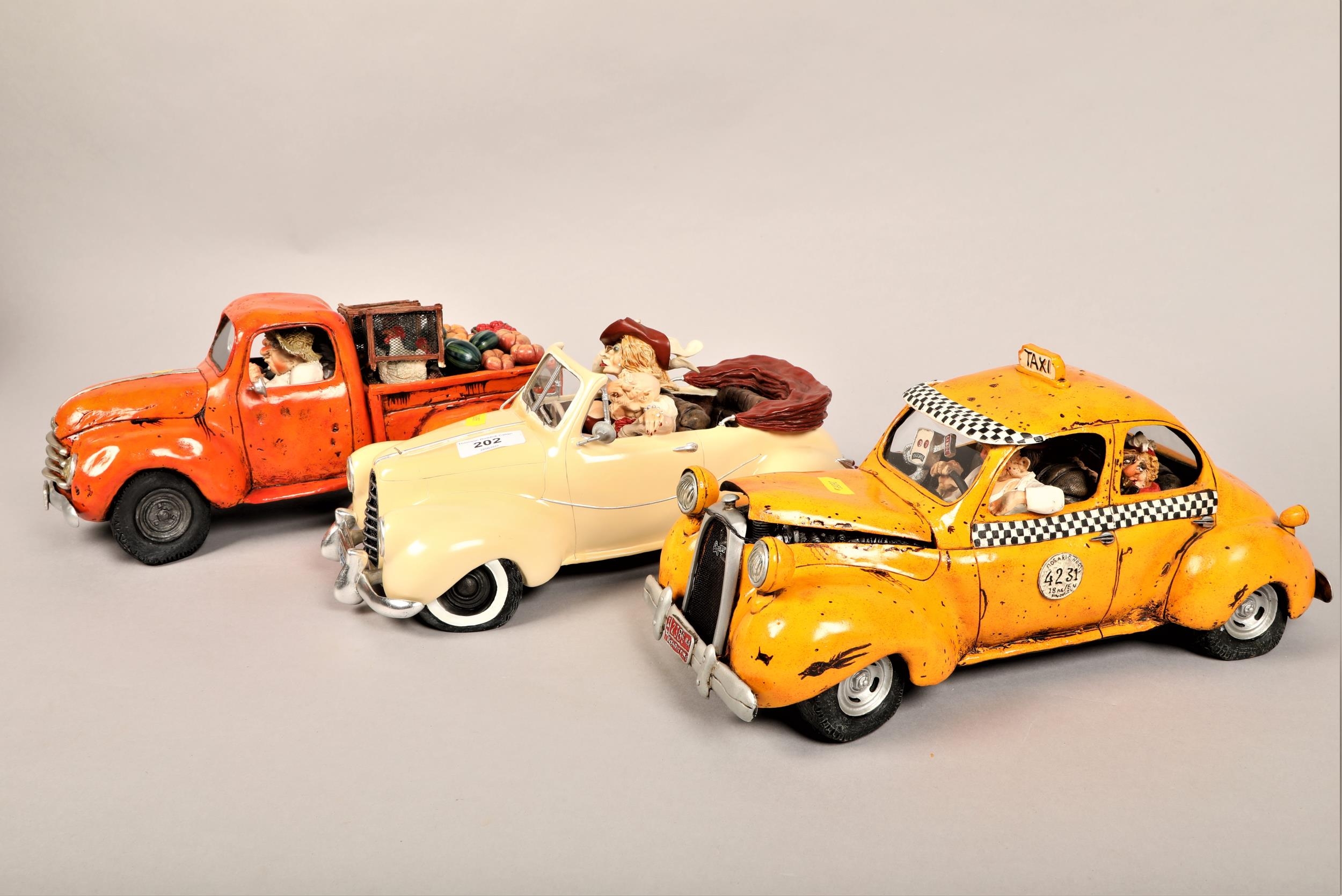 Three decorative Guillermo Forchino character cars, Taxi no.00573