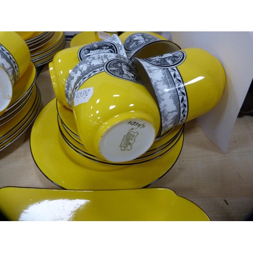 10 - Shelley part tea set decorated with a pictorial scene of female dancers on a yellow ground.  (39)